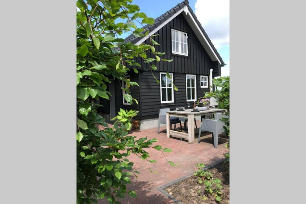 Uniek Houten Huis Nabij Bos En Plassen Hollandsche Rading Esterno foto